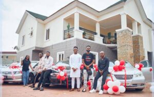 "When God Wants To Help You, He Sends A Man" Singer Moses Bliss Gifts His Singers & Barber for 9 Years , Three Cars (VIDEO/PHOTOS)